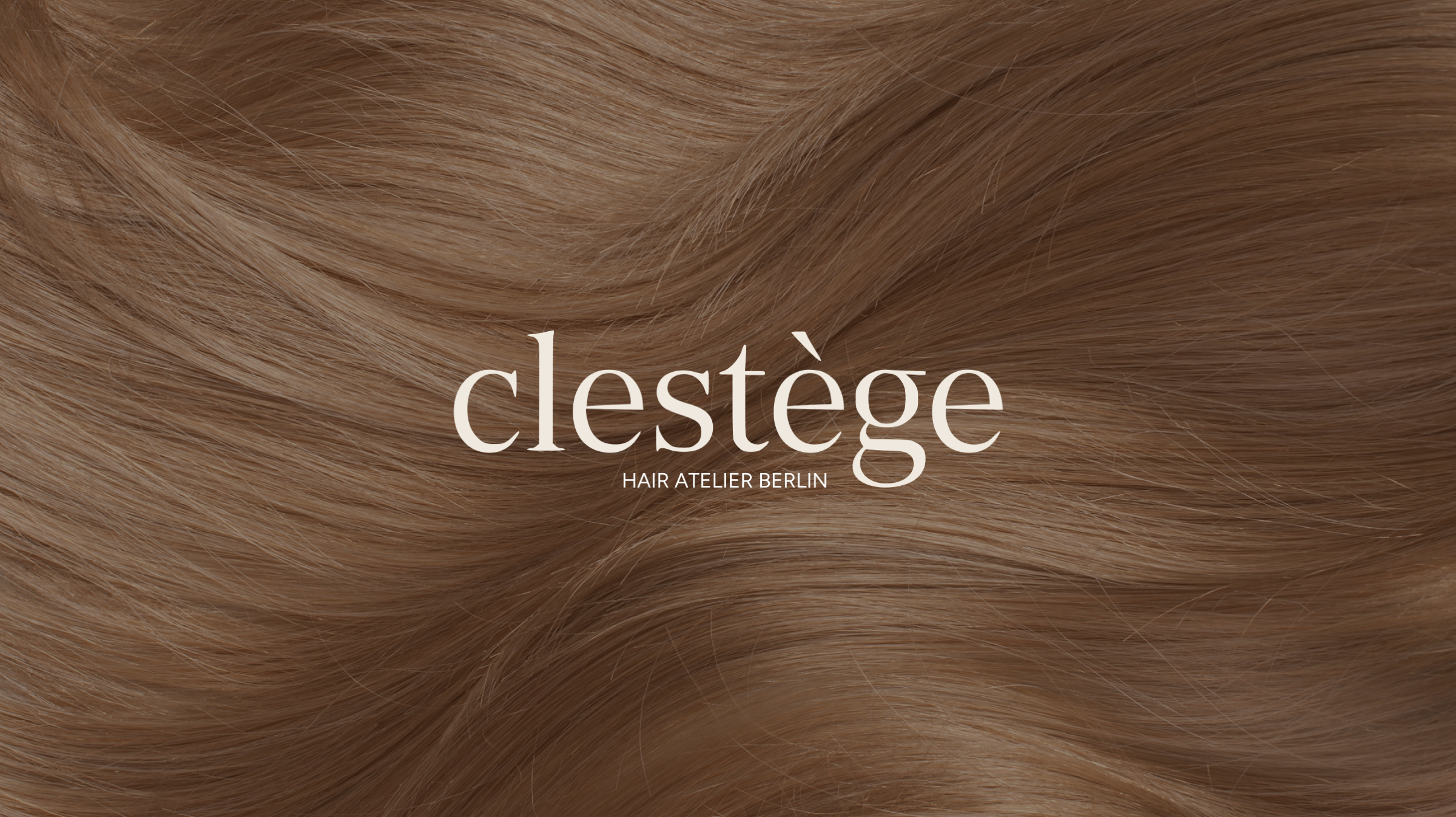 Clestège — Hair Atelier Berlin wordmark over flowing hair